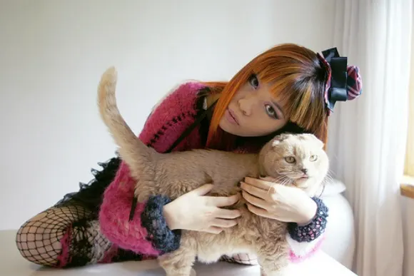 La Carmina with her Scottish fold cat, Basil Farrow Photo: LaCarmina.com