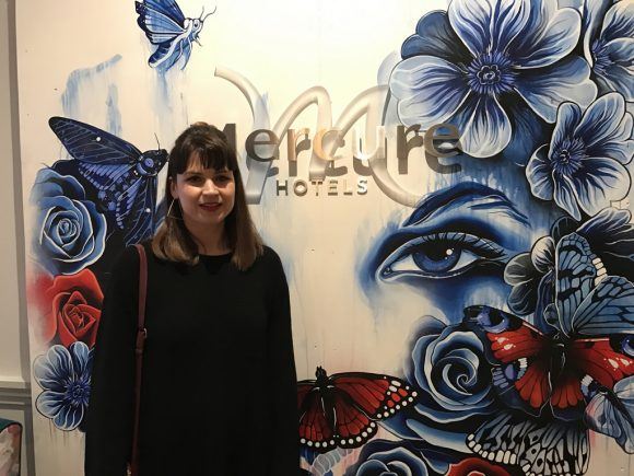 Gemma Compton with her artwork at Grand Hotel photo: Heatheronhertravels.com